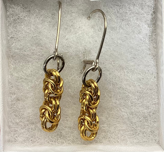 Base metal earrings with Sterling Silver ear wire by Iris