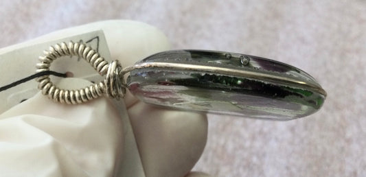 Wire wrapped fused glass pendants by Cheryl Olafson