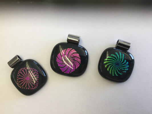 Dichroic wheel fused glass pendants